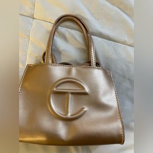 Small rose gold Telfar purse